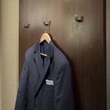 warwick rittenhouse suit hanging by closet